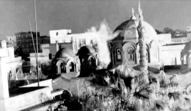 Photo of Mary hovering with arms stretched over St.Mary's Coptic Church in Egypt